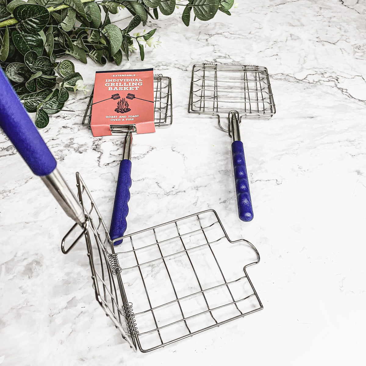 Camping cookout using the extendable roasting and grilling basket — gift for dad who loves the outdoors